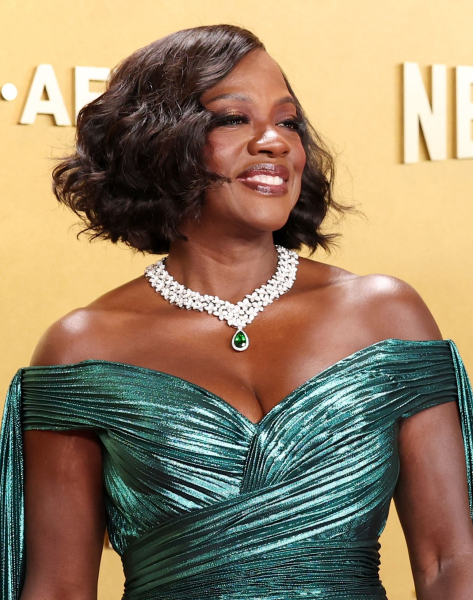 Viola Davis smiling in a teal offtheshoulder gown